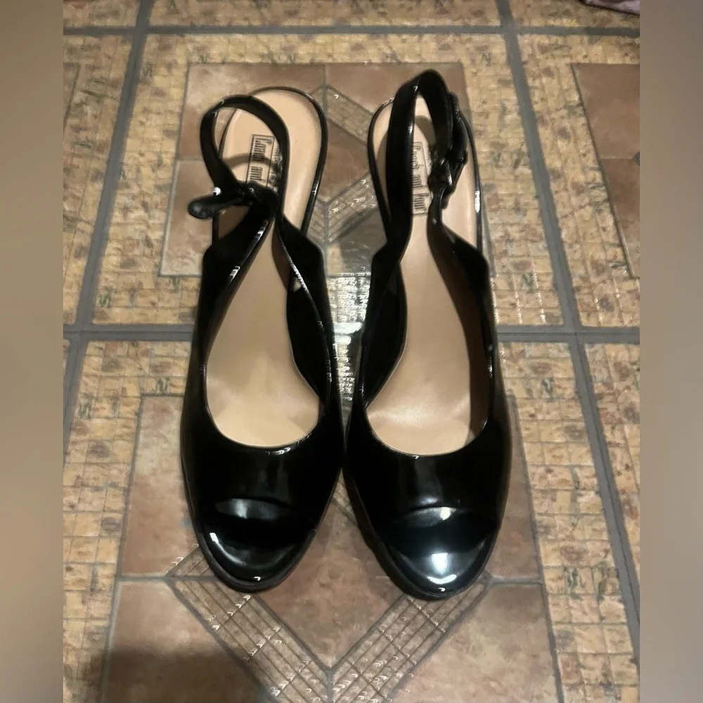 Coach and four Black heels